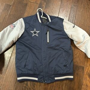 Brand new, never worn reversible Nike Dallas Cowboys jacket!